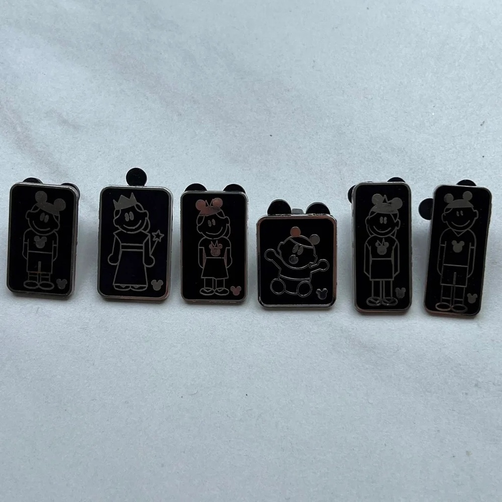 Lot of hidden mickey disney trading pins people with mickey ears hats